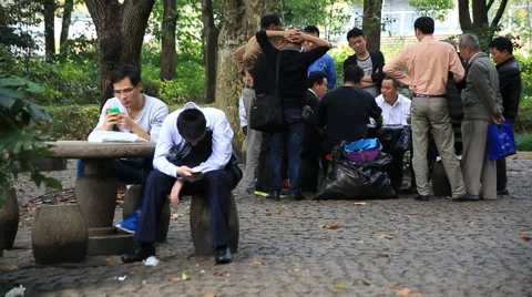 People spending time at People's square park in Shanghai Stock Footage 56802471