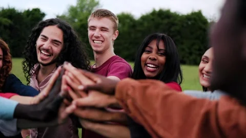 People stacking hands in circle in summer day. Group of friends celebrate Stock Footage 280435411