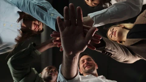 People stacking hands together in pile, sales team engaged in corporate Stock Footage 155173078