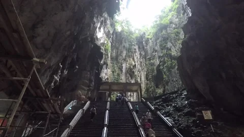 People on staircase inside Main Temple cave, Batu caves, Kuala Lumpur, Malaysia Stock Footage 196374851