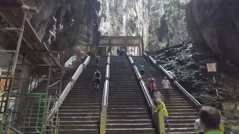 People on staircase inside Main Temple cave, Batu caves, Kuala Lumpur, Malaysia Видео 196389093
