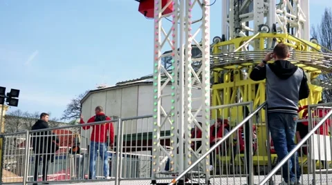 People stand in front of funny attraction Stock Footage 61966516
