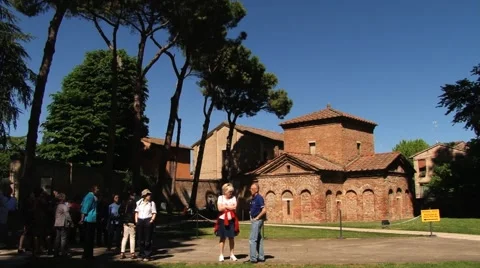 People stand in front of the Mausoleum of Galla Placidia in Ravenna, Italy. Stock Footage 59794644