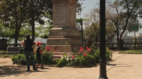 People stand in front of the monument to Don Pedro de Valdivia, Santiago, Chile. Stock Footage 49080485