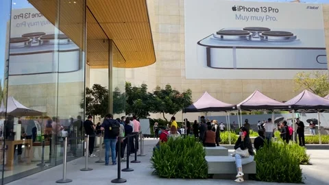 People stand in the line for the latest iPhone 13 in Apple Store Mexico City, 4K Stock Footage 162590765