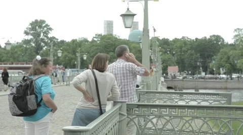 People stand at a parapet 스톡 동영상 52136470