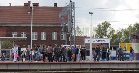 People Stand On The Platform Wait For The Train Main Railroad Station In Opole Stock Footage 54638477