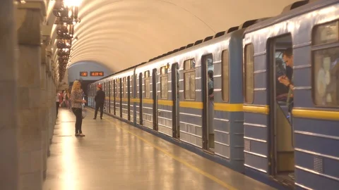 People stand on the platforms waiting for a train.  train leaves metro station Stock-Footage 113968184