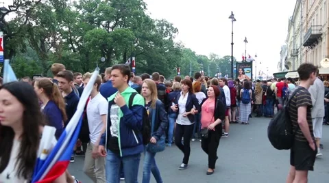 People stand in a queue in the center of St. Petersburg Stock Footage 67340022