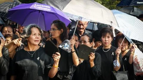 People stand on the queue to join The Royal Cremation for His Majesty the lat Photos