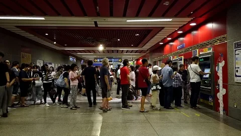 People stand on the queue pay the MRT fare at MRT subway station Video stock 124035969