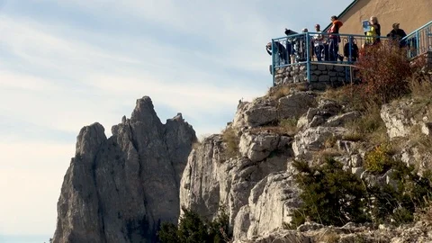 People stand on viewing platform of Mount Ai-Petri. Video stock 106607837