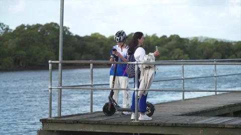 People standing on the decking wharf around the Woy Woy tidal baths, Australia Stock Footage 333519982