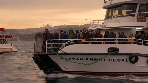 People standing on the ferry approaching the pier, istanbul in the background 스톡 동영상 229929535