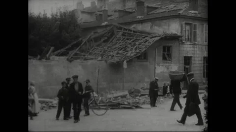 People standing in front of damaged buildings Stock Footage 43331329