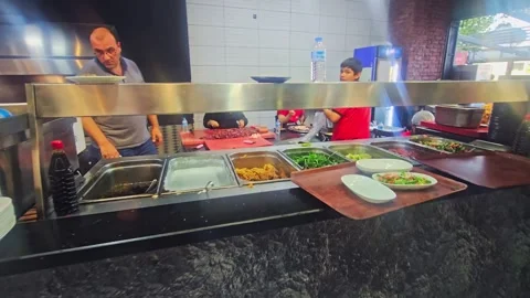 People standing in a kitchen. Stock Footage 282994496