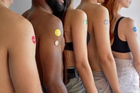 People standing in line, in queue after vaccination. indoors. side view, close Stock Photos
