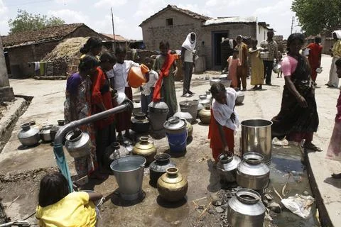 People standing in queue to collect water, Marathwada, Maharashtra, India ... Stock Photos