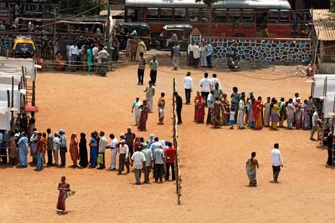People standing in queue at polling station to casting vote in elections B... Stock Photos
