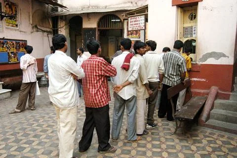 People standing in queue to purchase cinema tickets at Edward Theatre at K... Stock Photos