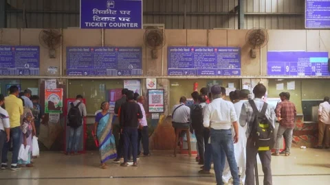 People standing in queue at ticket counters, Andheri Railway Station Stock Footage 304343121