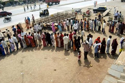 People standing in a queue to vote during the 2004 Indian Loksabha electio... Stock Photos