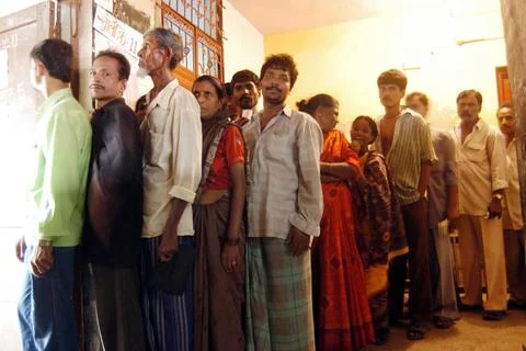 People standing in a queue to vote during the 2004 Indian Loksabha electio... Stock Photos