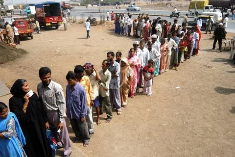People standing in a queue to vote during the 2004 Indian Loksabha electio... Stock Photos