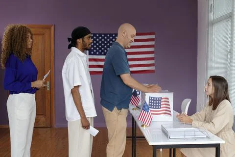 People Standing In Queue To Vote For Their President Stock Photos