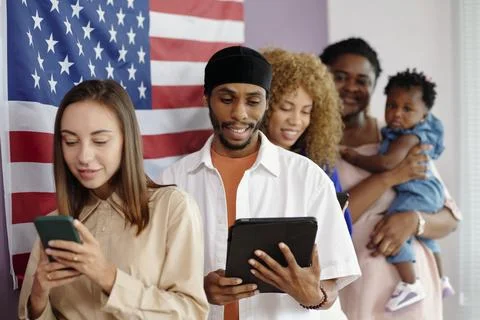 People Standing In Queue In Voting Centre Stock Photos