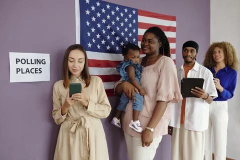 People Standing In Queue In Voting Centre Stock Photos