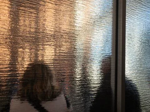 People standing waiting in a queue indoors 스톡 사진