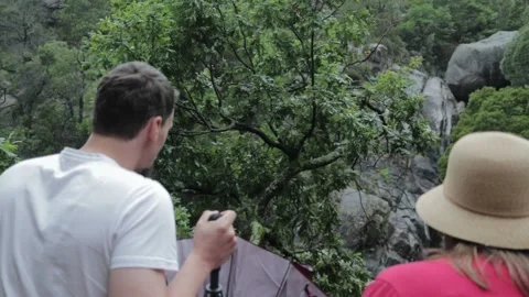 People staring at a waterfall Stock-Footage 233105753