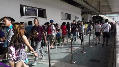 People stay in a queue to MRT, Manila, Luzon, Philippines Stock Footage 149112981