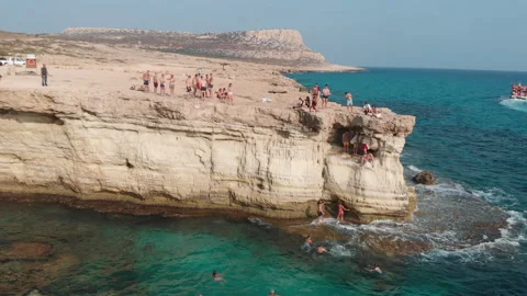 People stayed on the Beautiful cliffs and arches in Aiya Napa, Cyprus Stock Footage 158109713