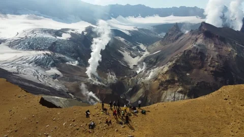 People at a steaming volcano Stock Footage 167813180