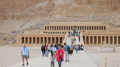People on the Steps of the Ancient Building Stock Footage 128929532