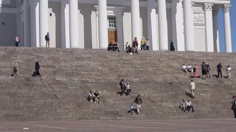 People at steps of Helsinki Cathedral at Senate Square in Helsinki, Finland Vídeo Stock 341358251