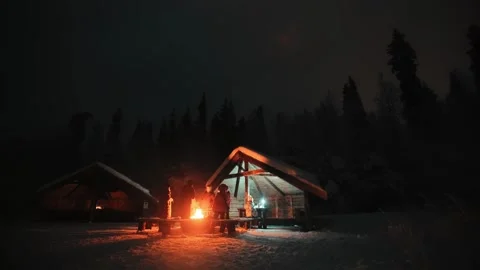 People stood round fire at laavu in Stock Video Pond5 - Main Image