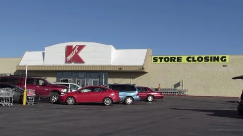 People stop in for Out of Business sales at KMart Store Closing in Kingman AZ Stock Footage