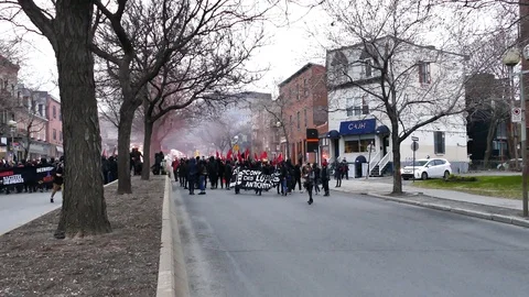 People in the street protesting Stock Footage 114762181
