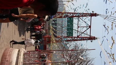 People on the streets of Rishikesh. Vertical video. Stock Footage 124657565