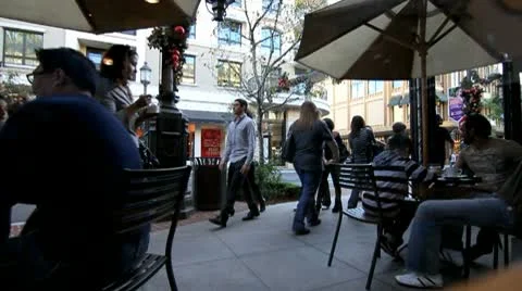 PEOPLE STROLLING DOWN THE PLAZA Stock Footage 9318941