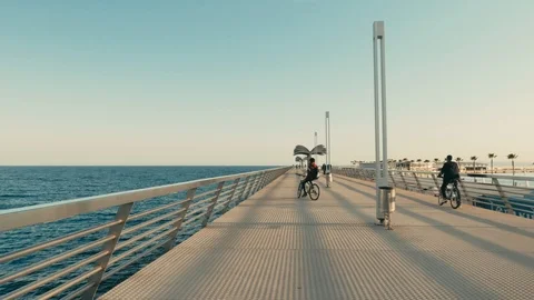People strolling on the jetty of the dock Stock Footage 104670031