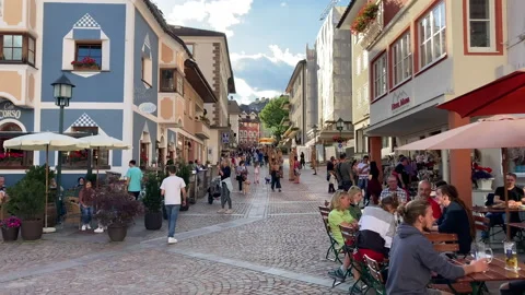 People strolling through the center of Ortisei. South Tyrol, Val Gardena, Italy. Stock Footage 172048853