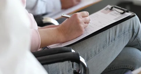 People students are sitting in queue with documents for obtaining an American Stock Footage 250163992