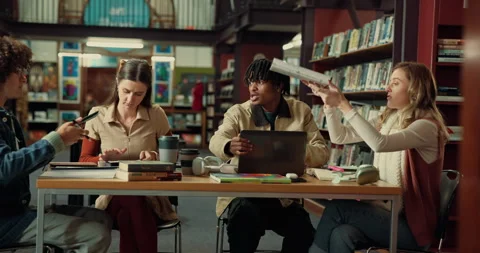 People, students or studying in library with group for learning, education or Stock Footage 310496733