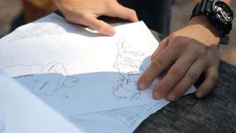 People study the map, choosing the best option. Stock Footage 85136091