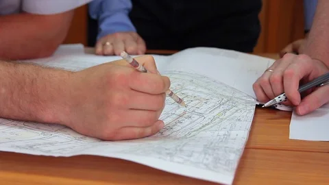 People study the project.. Close up. Stock Footage 97776426
