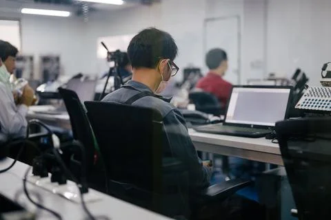 People studying and learning robot operating system at manufacturing automation Stock Photos